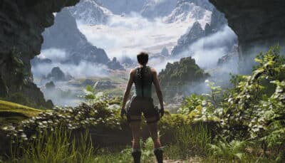 Lara Croft surveys a vast mountainous landscape in Tomb Raider: Legacy of Atlantis
