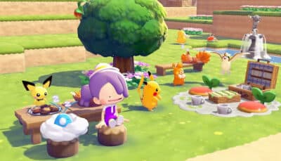 Characters and Pokémon from Pokémon Pokopia enjoying a peaceful picnic under a tree, with Pikachu, Pichu, and other creatures relaxing in a colorful meadow