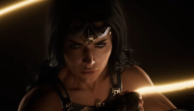 Wonder Woman focuses intensely as golden light reflects in her eyes