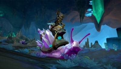A character rides a crystal covered snail inside a glowing cave in World of Warcraft