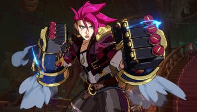 A pink haired fighter raises massive mechanical gauntlets before attacking in 2XKO