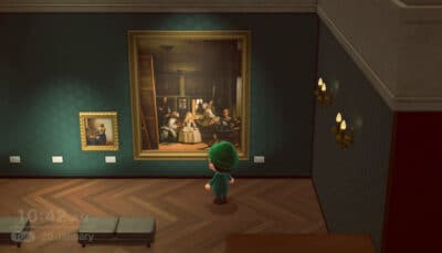 Animal Crossing: New Horizons player viewing artwork in the museum art gallery