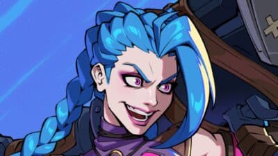 A close up portrait shows Jinx from Arcane with blue braids and a wild expression in 2XKO artwork