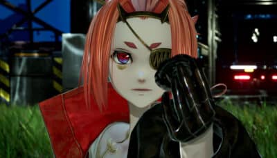 A close up of a red haired fighter with a mechanical eye patch prepares for combat in Code Vein II