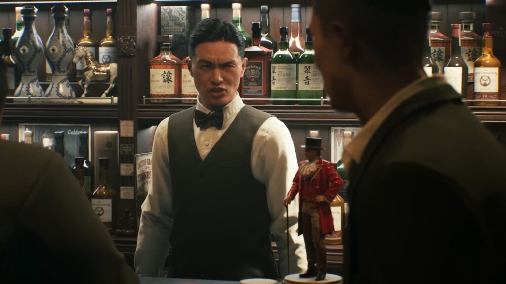 A bartender in Gang of Dragon confronts two men across the counter during a tense conversation