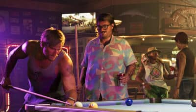 Characters play pool in a neon lit bar in Grand Theft Auto 6, showing the game’s gritty nightlife atmosphere