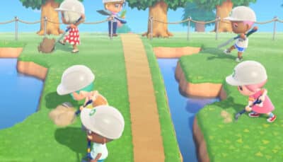 Several villagers dig around rocks together to farm iron nuggets in Animal Crossing New Horizons
