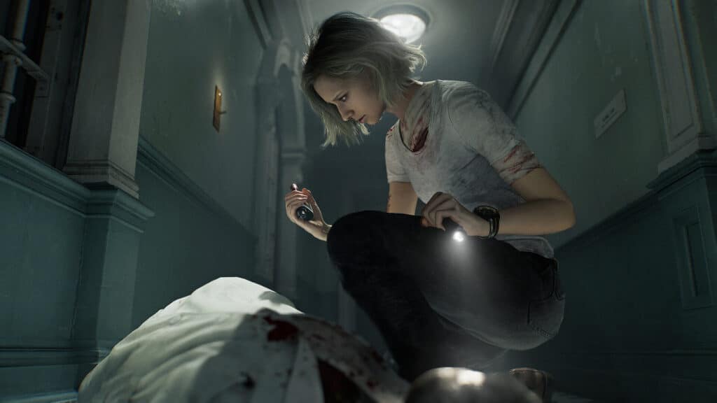 A female character crouches with a flashlight to inspect a body in a narrow corridor in Resident Evil Requiem