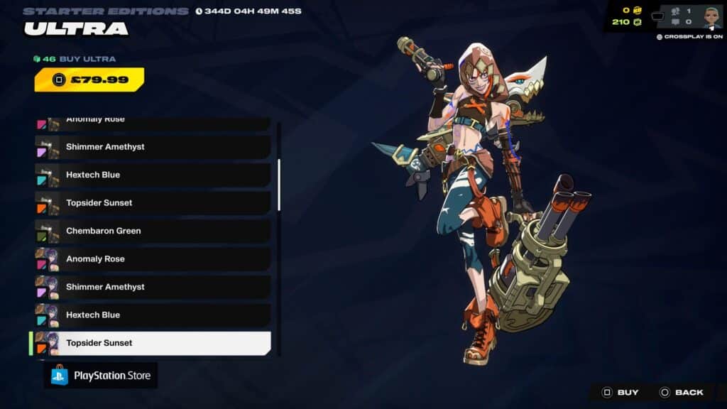 ジンクスは2XKOでオレンジのアクセントが付いたトップサイダーサンセットカラーバリエーションを着用し、武器を持ってポーズをとっています。