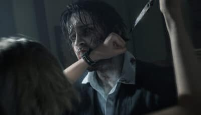 A survivor blocks a knife attack from an infected enemy during an intense close combat moment in Resident Evil Requiem