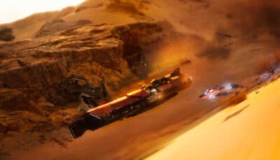 A racing ship speeds through a sandy canyon during an intense Star Wars Galactic Racer chase