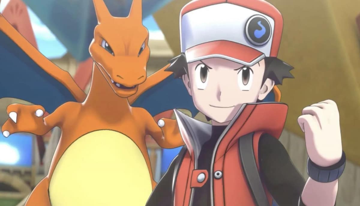 A Pokémon trainer stands confidently beside Charizard inside a brightly lit arena