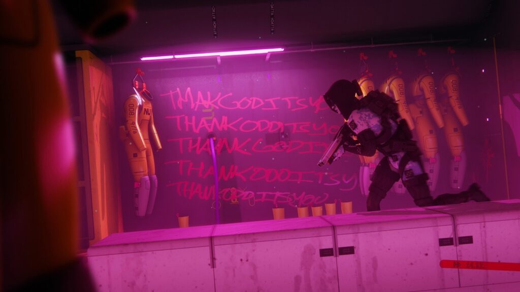 A screenshot from the game Marathon shows a character in dark tactical gear crouching in a brightly lit, pink-hued room. Yellow protective suits are hanging on the back wall, which is covered in pink graffiti repeating the phrase "THANK GOD IT'S YOU"