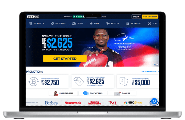 BetUS sports promotion homepage on a laptop screen