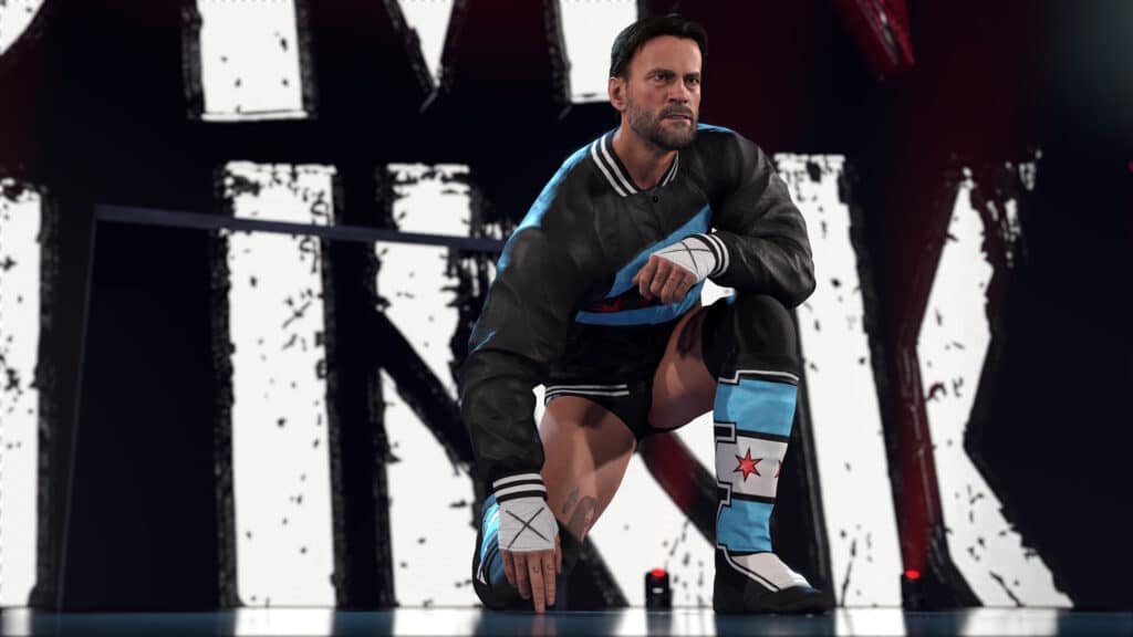 CMパンクが入場ジャケットとニーパッドを着けてWWE 2K26のステージでポーズをとる