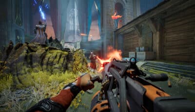 Highguard first-person combat with a heavy machine gun inside a ruined cathedral during an active firefight.