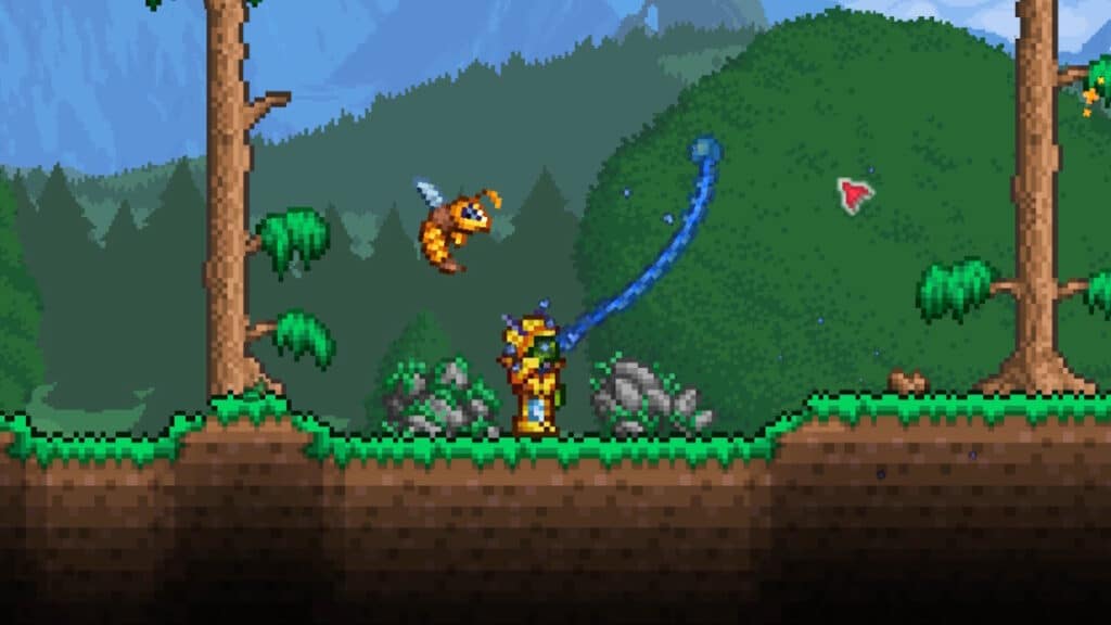 A player character uses a slime themed whip to attack enemies in Terraria 1.4.5 during combat