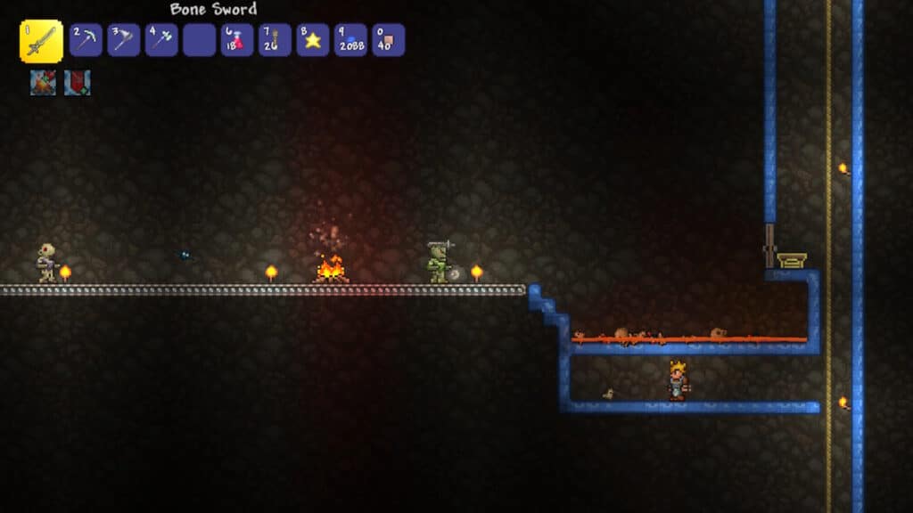 プラットフォーム、敵、キャンプファイヤーを備えた Terraria Skyblock の地下セットアップ