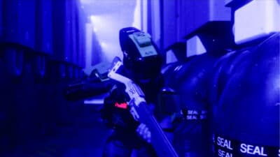 Recon running through a map, tracing footsteps leading to hostiles in Marathon the game.