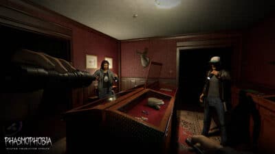 Image of ahaunted house with three ghost detectives looking for clues.