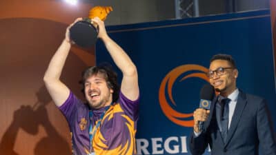 Picture of Pedro, the winner from Rifftbound Lille event holding th etrophy