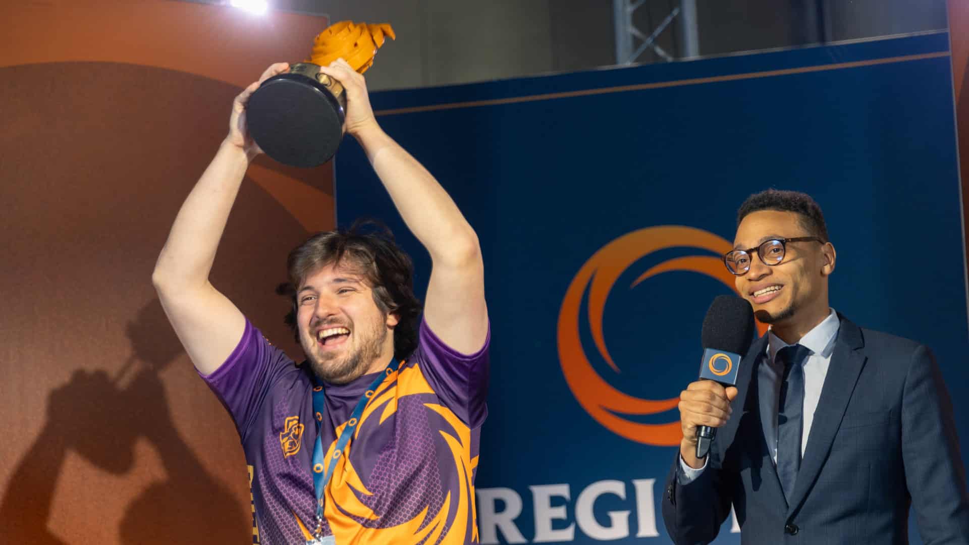 Picture of Pedro, the winner from Rifftbound Lille event holding th etrophy