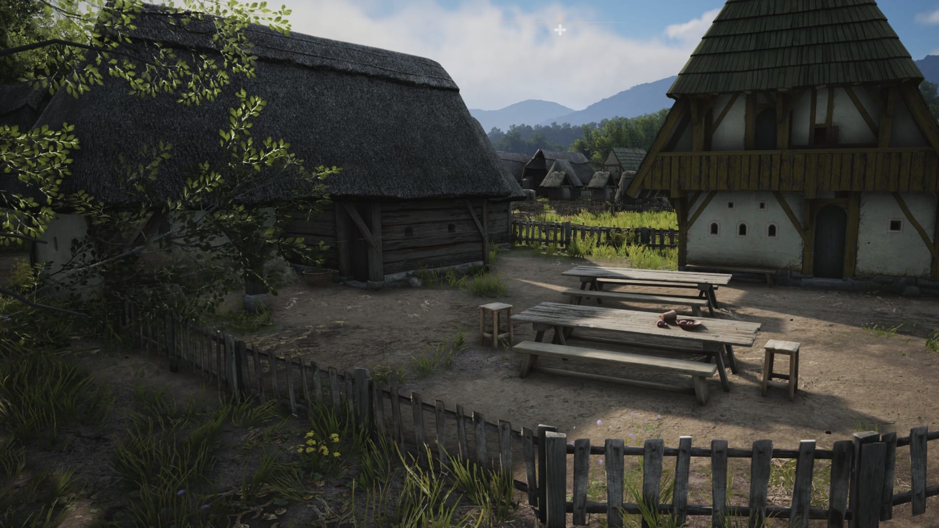 Image of a medieval thatch tavern from the Manor Lords game.